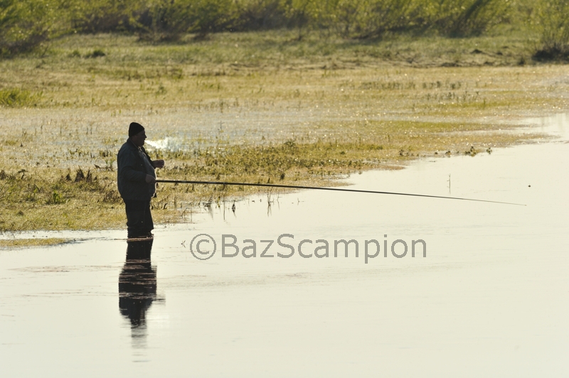 Belorussian man Fishing 'having a fag'